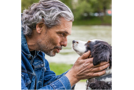 Owner having a chat with his dog