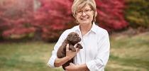 Terri Keller with a puppy