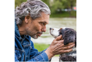 Owner having a chat with his dog